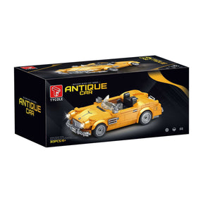 T1097 - gelbes Cabrio inkl. Vitrine (TGL)
